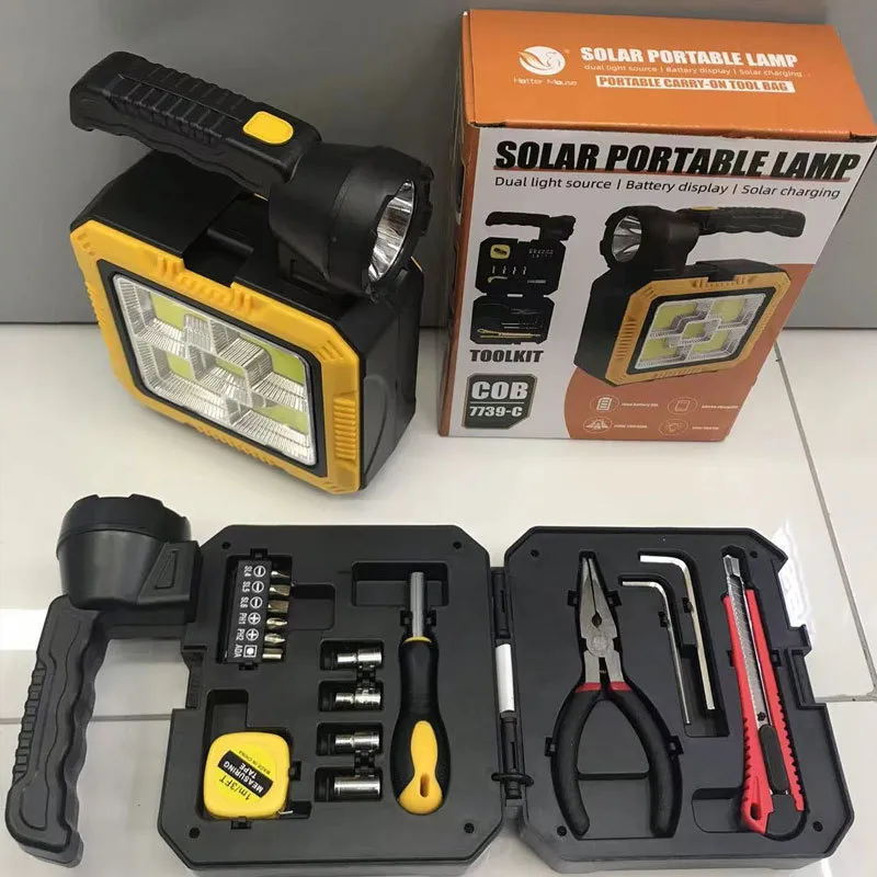 Projecteur solaire portable avec trousse à outils intégrée