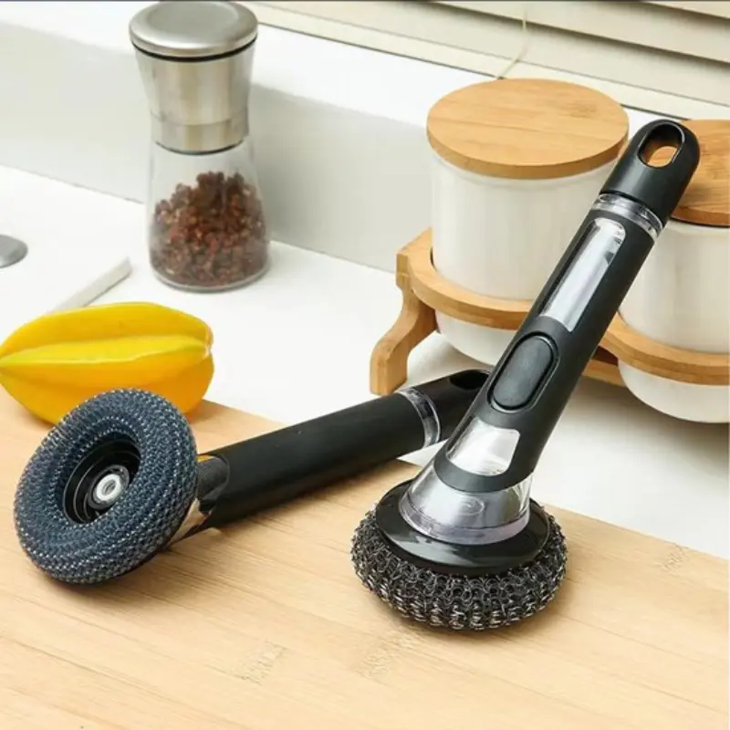 Brosse à vaisselle avec distributeur de détergent